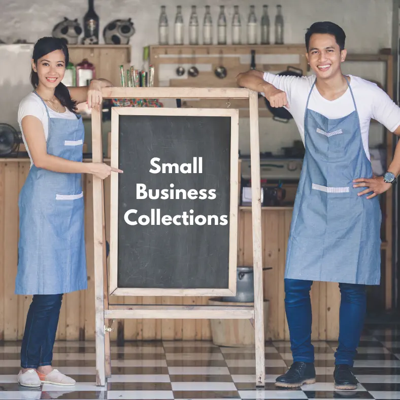 Shop-Small-Business-Owners-Holding-A-Sign-Saying-Small-Business